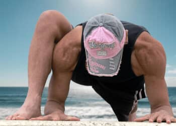 Lizard Pose stretching the hip flexors and psoas muscle, combining deep hip opening with mindful breath and body awareness.