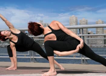 Bound Side Angle Pose and Extended Side Angle Pose side by side, highlighting shared leg, hip, and core foundation with different upper body positions.